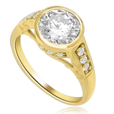 Bezel Set Ring Boasts of 2 Ct Round Solitaire in a unique contemporary band with round accent melee. A sheer beauty! 3 Cts. T.W. In 14k Gold Vermeil.