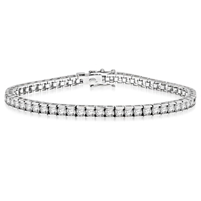 Diamond Essence 7 inches long classic bracelet, showing off appx. 6.0 cts. round briliiant stones set in tension bar setting of 14K White Gold.