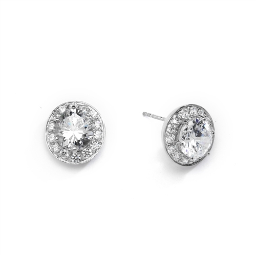 Mini marvelous pair of six-prong set designer earrings with 2.25 Cts. each simulated oval cut center Diamond with round brilliant melee by Diamond Essence set in 14K solid white gold. 5.50 Cts.t.w