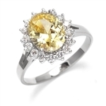 Light your fire with this Cocktail Ring,3 cts. Oval cut Canary Diamond Essence Center and accents encircling the fireworks! 3.5 Cts. T.W. set in 14K Solid White Gold.