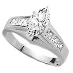 Diamond Essence Ring With 0.75 Ct. Marquise Center Followed By Channel Set Princess Stone Enhance the look Of Band In 14K White Gold, 1.50 Cts.T.W.