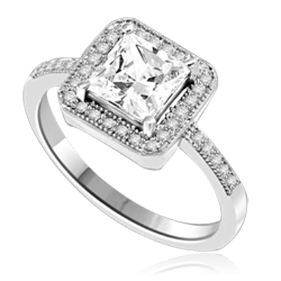 Princess cut Diamond Essence centerpiece,surrounded by Round Brilliant Melee in this pretty Engagement Ring. 2.0 Cts. T.W. set in 14K solid White Gold.