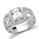 Diamond Essence Designer Ring With 1.50 Cts. Emerald Cut Diamond Essence Center Surrounded By Melee And Exquisitely Set Round Brilliant Melee On Both The Sides Of Band, 2.50 Cts.T.W., in 14K Solid White Gold.