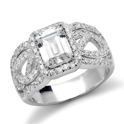 Diamond Essence Designer Ring With 1.50 Cts. Emerald Cut Diamond Essence Center Surrounded By Melee And Exquisitely Set Round Brilliant Melee On Both The Sides Of Band, 2.50 Cts.T.W., in 14K Solid White Gold.