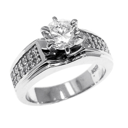 Diamond Essence Ring With 1 Ct. Round Brilliant Center Set in Six Prong Setting and Sparkling Melee on The Band Enhance the look in 14K White Gold,1.25 Cts.T.W.
