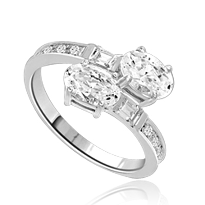 Two  Oval Essence, 1.0 ct. each, set in four prongs and accompanied by baguettes and melee on band. 2.5 Cts. T.w. In 14k Solid White Gold.