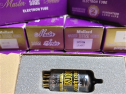 COLLECTORS ITEM - NO RETURNS - NO EXCHANGES - NO REFUNDS - ALL SALES FINAL LIMITED QUANTITY. 
Brand New, RARE MINT NOS/NIB 1972 Mullard MASTER SERIES ECC82 12AU7 halo Getter with Gold Pins. Etched Blackburn Production Date Codes B2A1. Made in GT. Britain