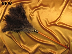 These are ostrich feather dusters with a gorgeous stained wooden handle and leather loop. A total length of 28" (12" head and 16" handle).