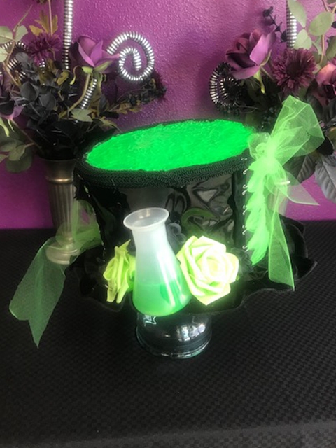 BIG TOP HAT TOXIC All Hilary's Vanity Hats are hand made by Hilary shipping can take up to 2 weeks depending of if we have to make a new one or if it is in stock.