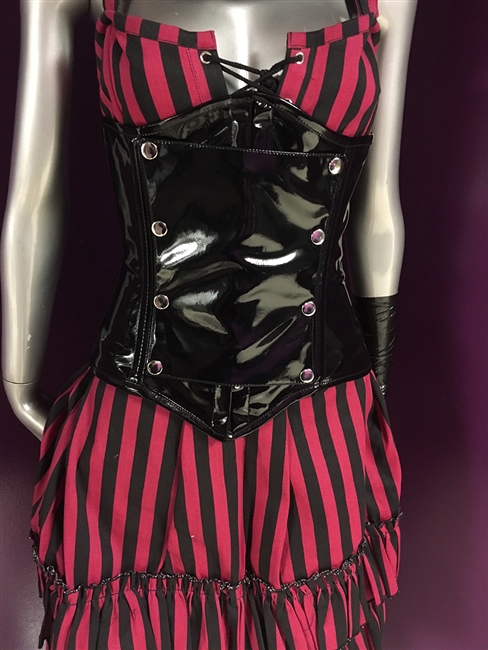 Vamp Waist Cincher is done in our Black PVC fabric and has a snap on panel on the front. This corset Features Back lacing, Front busk closures, a privacy panel, and has steel coil boning.