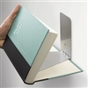 Small Floating Bookshelf with concealed feet to catch the cover of the book.