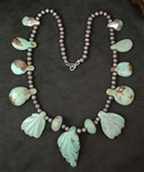 LEEKYA DEYUSE DOUBLE SIDED CARVED LEAF NECKLACE