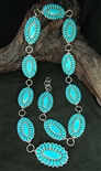 STRIKING ALICE QUAM TURQUOISE CONCHO BELT