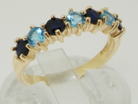 Magnificent 9K Yellow Gold Blue Topaz and Sapphire Half Eternity Ring