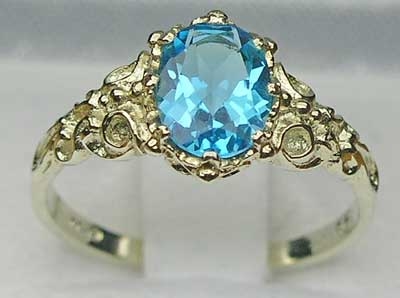 Stunning 14K White Gold Blue Topaz Solitaire Ring