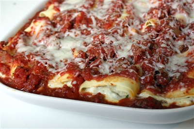 Cheese Stuffed Manicotti with Meat Sauce