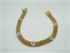 18k (750) yellow and white gold cubic zircon heart bracelet