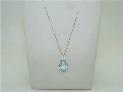 Diamond and light blue topaz pendant with chain