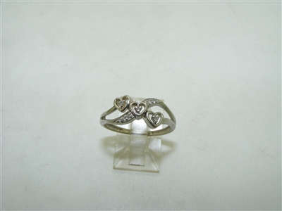 Diamond ring with 3 hearts
