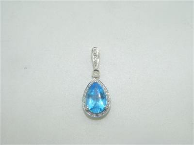 14k white gold diamond and blue topaz pendant