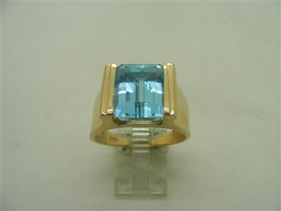 Ladies 14k yellow gold blue topaz ring