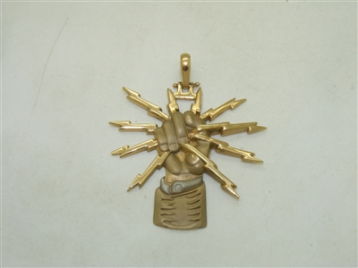 Hand Holding a Lightning Bolt Pendant