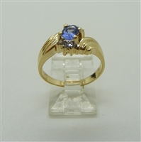 Ladies Oval Tanzanite and Diamond Ring. (14k Yellow Gold)