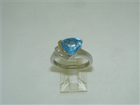 Beautiful Silver and Yellow Gold Blue Topaz Diamond ring