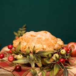 Start with a lovely holiday pie perfectly blended with fresh apples and holiday cranberries and glazed with crystal sugar. Add a beautifully decorated gift box for the season with a handsome holiday ornament.