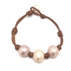 photo of Wendy Mignot Daisy Three Pearl Freshwater Pearl and Leather Bracelet with Knots Blush