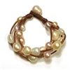 photo of Wendy Mignot Music Four Strand Freshwater Pearl and Leather Bracelet Multicolor