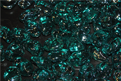 Odd irregular shaped shiny teal colored fire crystals