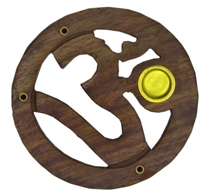 Wooden incense burners ( "om" character in India)