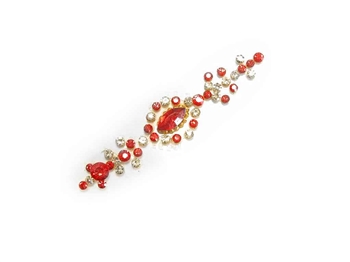 Extra large bindi made entirely of red and white crystals.