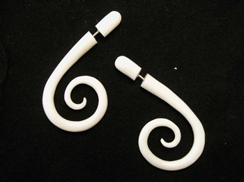 Two inch long fake gauges with a spiral at the bottom in bone.