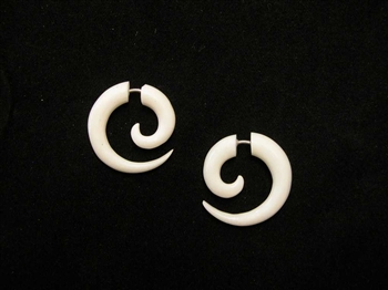 Organic bone earrings carved into a spiral less than 1" long.