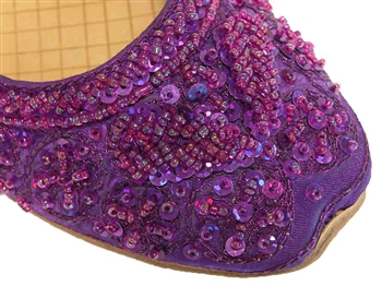 Jewel toned purple silk with matching beads and sequins in Bollywood style shoes.