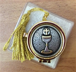 Gold pyx with silver engraved chalice