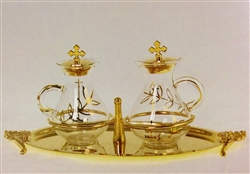 Glass Cruets decorated in Gold on Bronze Gilt Tray.