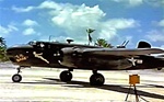 Photo of a 75mm equipped  North American B-25G Michell medium bomber from the 48th Bomb Squadron, 7th Army Air Force, on the runway on the Island of Apamama in the Gilbert Islands in World War 2