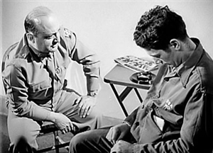 A serviceman undergoes hypnosis during treatment