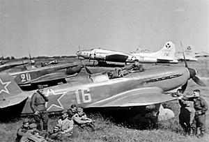 Photo of a Boeing B-17 bomber and Yak fighters taken at a Russian base during Operation Titanic aka Operation Frantic Joe during World War 2.