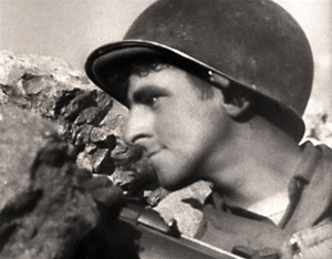 Photo of a GI in Italy taken from John Huston's award winning World War 2 film film The Battle of San Pietro.