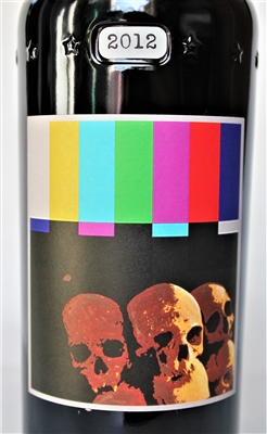 750 ml bottle of 2012 Sine Qua Non Touche Estate Syrah from the Eleven Confessions Vineyard produced and bottled in Ventura California by Manfred Krankl scoring 100 points from Robert Parker's Wine Advocate