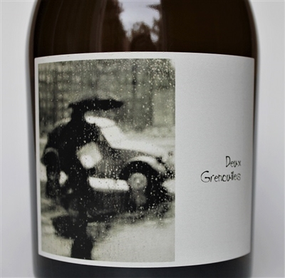 750 ml bottle of Sine Qua Non 2016 Deux Grenouilles white wine from Ventura California with a blend of Roussanne, Chardonnay, Petite Manseng, Viognier and Muscat.