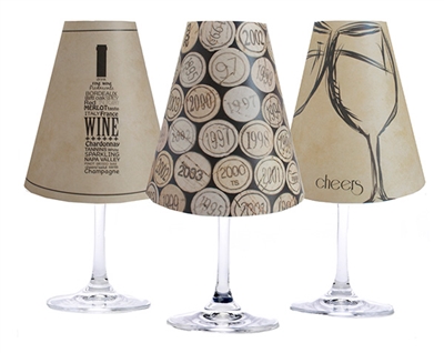 Set of 6 coordinating wine bottle, cork and cheers pattern translucent paper white wine glass shades.  Available in parchment and white.  Made in the USA,