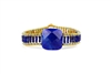 Ziio's small Armonia Tennis Bracelet features a large Lapis Gemstone at the center with Blue Quartz Gemstones on the band. Gold Murano Glass seed Beads outline the band. 925 Sterling Silver Button Closure, adjustable in length.