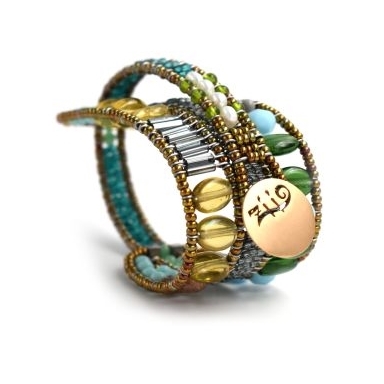Ziio's new Evolution Bracelet is designed to fit any wrist, from child to adult. With an innovative fastening technique, it becomes a universal model for all. Hand crafted in Yellow Citrine, Blue Turquoise, Labradorite & Peridot Gemstones.