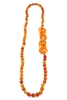 Long Carnelian Gemstone Necklace made in Italy, by Rajola. The Necklace is accented with interlocking infinity rings of Carnelian Seed Beads that can be worn asymmetrically or at the bottom. 18K Gold Chain Accents & logo. No latch. Length 33"