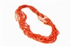 Stunning, multi-strand, Sciacca Coral Necklace by Rajola. Coral Nugget Necklace has a large, hand carved, Carnelian Medallion that holds the strands. No Latch. Sciacca Coral is 2,000 to 5,000 year old petrified Coral.